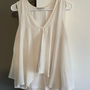 Basic white work/social tank. Flowy sheer fabric in front
